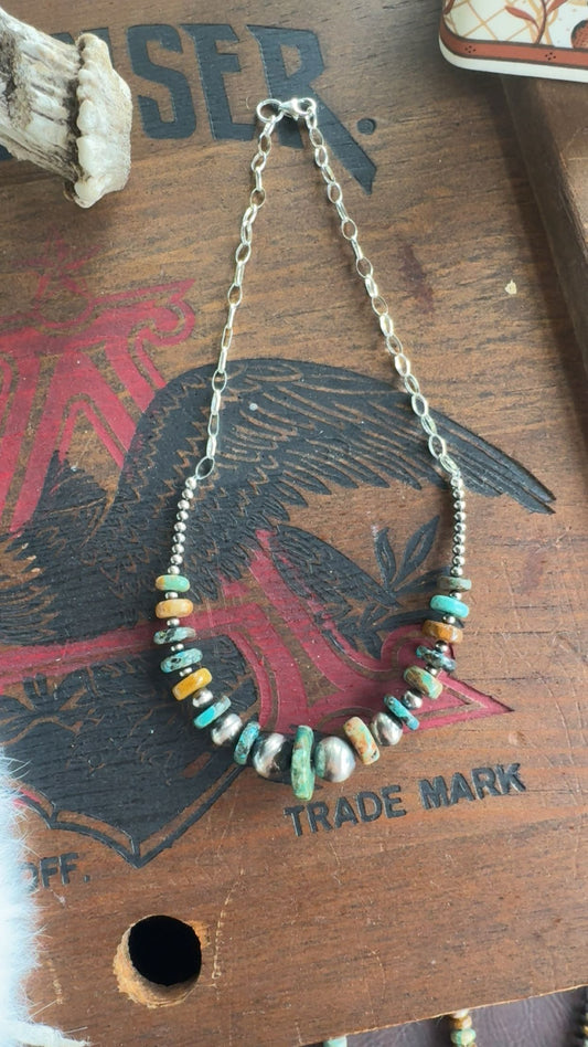 Small graduated turquoise and pearls